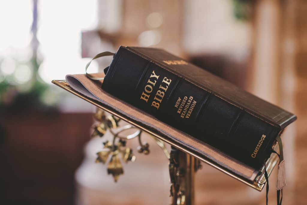 Holy Bible on a lectern, New Revised Standard Version.